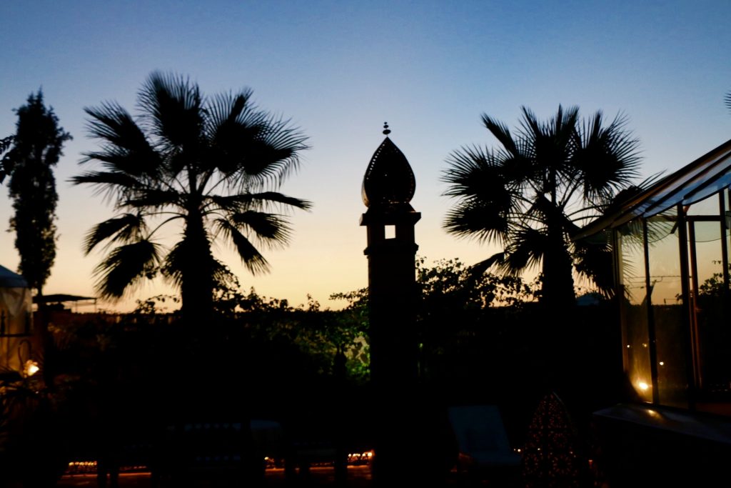 marrakesh at sunset from the rooftop of a Riad.